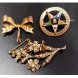 THREE NINE CARAT GOLD BROOCHES comprising a seed pearl set spray brooch, an enamel decorated Eastern