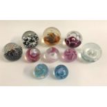 TEN CAITHNESS AND SELKIRK GLASS PAPERWEIGHTS the eight Caithness examples comprising Polka,