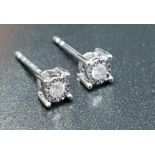 PAIR OF ILLUSION SET DIAMOND STUD EARRINGS the diamonds totalling approximately 0.1cts, in nine