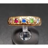 MULTI GEM SET GYPSY STYLE RING set with diamond, ruby, sapphire, emerald and aquamarine, in ten