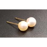 PAIR OF CULTURED PEARL STUD EARRINGS on nine carat gold mounts