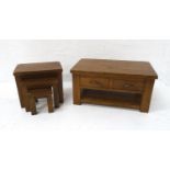 STAINED PINE OCCASIONAL TABLE with a plank top above two frieze drawers with a shelf below, standing
