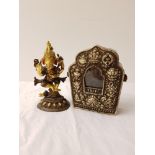 TIBETAN SILVER PLATED TRAVELLING PRAYER SHRINE of shaped outline with embossed mask, fish and