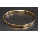 NINE CARAT GOLD BANGLE approximately 8.9 grams