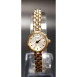 LADIES NINE CARAT GOLD ROTARY ELITE WRISTWATCH the dial with baton five minute markers, on nine