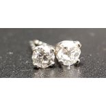 MATCHED PAIR OF DIAMOND STUD EARRINGS the diamonds totalling approximately 0.3cts, in nine carat