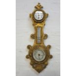 ANEROID CLOCK BAROMETER with enamel face and 30 hour movement over a mercury thermometer and a