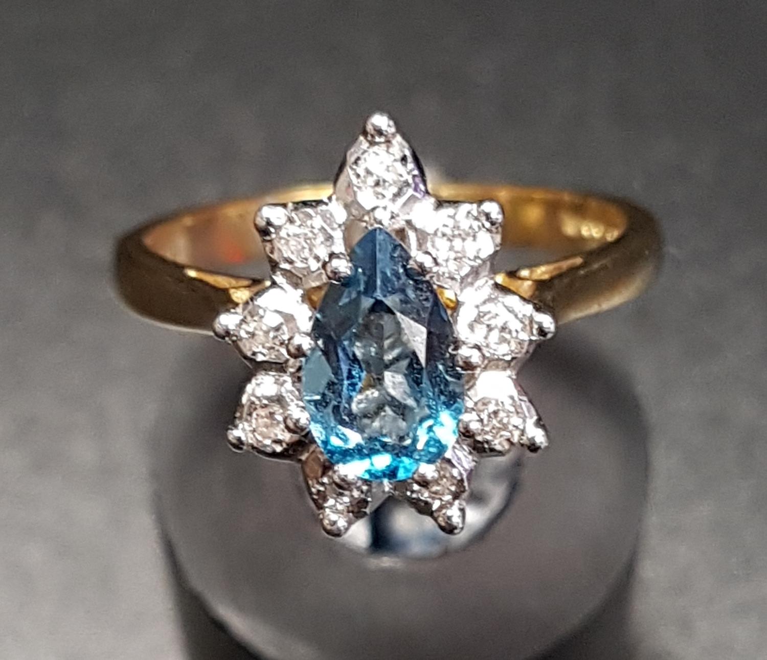 BLUE TOPAZ AND DIAMOND CLUSTER RING the pear cut blue topaz approximately 0.75cts in nine diamond - Image 2 of 2