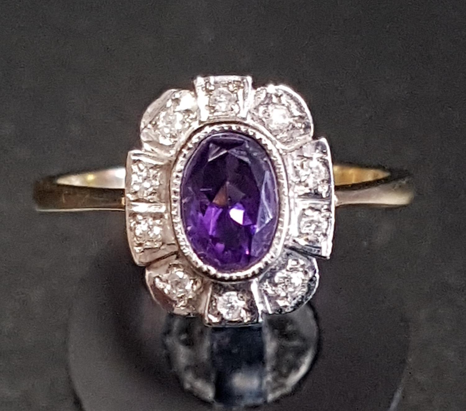 AMETHYST AND DIAMOND CLUSTER RING the central oval cut amethyst in ten diamond surround, on nine