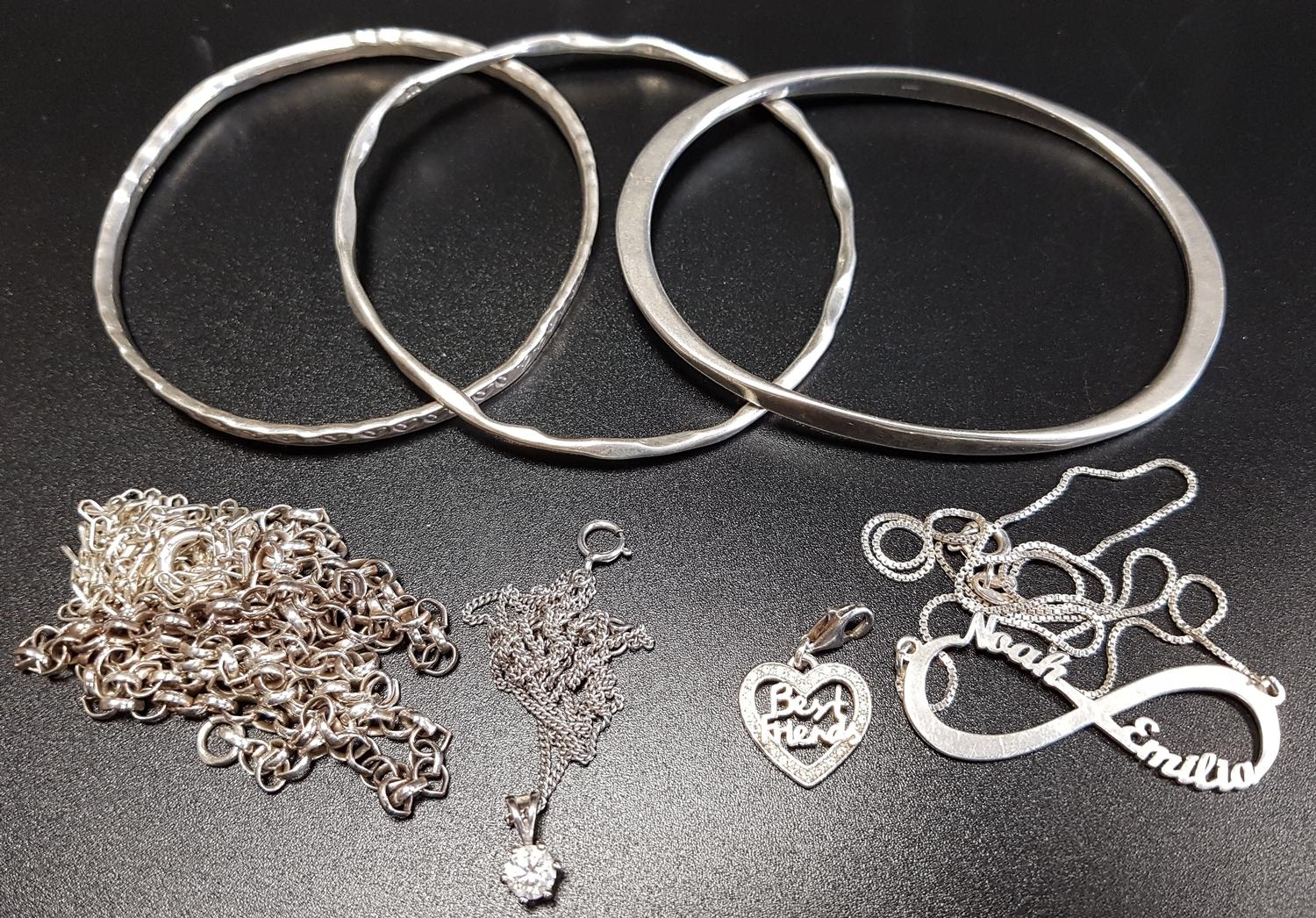 SELECTION OF SILVER JEWELLERY including three bangles, silver pendants and chains, and a Thomas Sabo