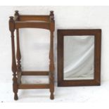 RECTANGULAR OAK FRAMED WALL MIRROR 54.5cm high; together with an oak stick stand of rectangular