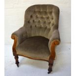GEORGIAN BUTTON BACK ARMCHAIR with a shaped back and scroll padded arms above a stuffover seat,