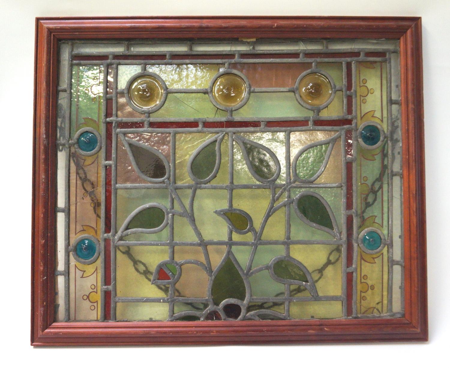 EARLY 20TH CENTURY LEADED GLASS WINDOW with stylised flowers, framed, 39cm x 48cm