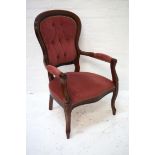 VICTORIAN STYLE MAHOGANY ARMCHAIR the shaped button back with decorative stud detail and shaped