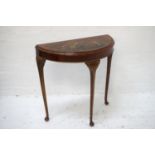 WALNUT DEMILUNE SIDE TABLE in the Japanese manner, the top decorated with a Japanese lady and