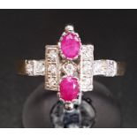 ART DECO STYLE RUBY AND DIAMOND PLAQUE RING the two oval cut rubies surrounded by multi diamonds, on
