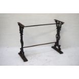 CAST IRON TABLE BASE with pierced sides with splayed supports united by two stretchers, 67cm high,