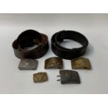 TWO WORLD WAR II LEATHER BELTS with six interchangeable metal buckles - three featuring the hammer