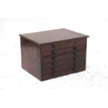 MAHOGANY TABLE TOP COLLECTORS CABINET with a lift up lid above five drawers with turned handles,