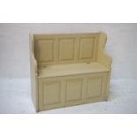 PAINTED PINE HALL BENCH with a three panel back and shaped sides above a lift up seat with a