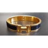 HERMÉS CLIC H BRACELET the hinged bangle with black enamel decoration