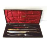 VICTORIAN SILVER MOUNTED DOUBLE CARVING SET comprising two knives and forks and a steel, all with
