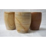 SET OF ELEVEN POLISHED STONE CUPS all in cream and brown tones with variegated finish (11)