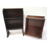 SMALL MAHOGANY BOOKCASE with an oblong top above shaped sides with two shelves below, standing on