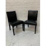 SET OF SIX DINING CHAIRS covered in black leather with faux raspberry suede backs, standing on