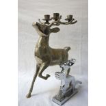 LARGE MODERN METAL CANDLE HOLDER modelled as a stag, 35cm high; together with a novelty chrome nut