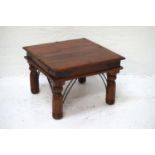 TEAK SQUARE OCCASIONAL TABLE with decorative iron work, standing on turned supports, 60cm x 60cm
