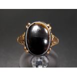 AGATE SET DRESS RING the oval cabochon banded agate on nine carat gold shank, ring size J