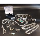 SELECTION OF SILVER JEWELLERY including an illusion set diamond line bracelet, three bangles, two