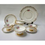 ROSINA PORCELAIN TEA SERVICE with floral and gilt decoration, comprising five tea cups, six