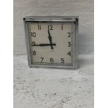 NEWGATE ART DECO STYLE WALL CLOCK with a square chrome case and white dial with Arabic numerals