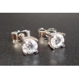 PAIR OF DIAMOND STUD EARRINGS the round brilliant cut diamonds totalling approximately 0.7cts, in