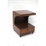 WALNUT SIDE TABLE with a square rotating top supported by shaped sides with a recess below, above