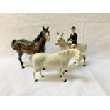 THREE BESWICK HORSE FIGURINES one depicting a hunts woman on her dapple grey horse, 21cm high; a