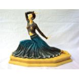 CONTEMPORARY ART DECO RESIN FIGURE of a dancing lady in tradition dress on shaped base, 28cm high