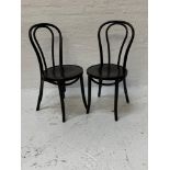 SET OF SIX BENTWOOD BISTRO STYLE CHAIRS the stained shaped backs above circular seats, standing on