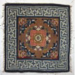 CHINESE DESIGN RUG PANEL the geometric border encasing a floral panel, 61cm x 57cm