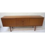 MCINTOSH & CO TEAK SIDEBOARD with a moulded top above three central drawers flanked by two fall