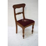 MID VICTORIAN MAHOGANY DINING CHAIR with a shaped top rail above a carved central bar with a