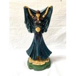 CONTEMPORARY RESIN FIGURE of a belly dancer in tradition dress and on shaped base, 37cm high
