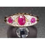 RUBY AND DIAMOND RING the three graduated rubies separated by small diamonds, on eighteen carat gold