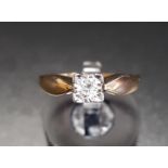 DIAMOND SOLITAIRE RING the illusion set round brilliant cut diamond approximately 0.12cts, on nine