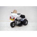 CHILDS ELECTRIC POLICE TRICYCLE with Police logos and livery, forward and reverse operation, with