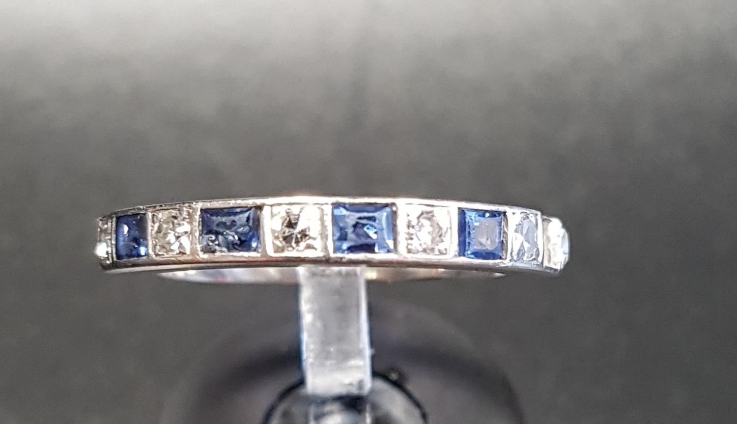 SAPPHIRE AND DIAMOND HALF ETERNITY RING with alternating sapphires and diamonds, on unmarked white