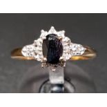 SAPPHIRE AND DIAMOND CLUSTER RING on nine carat gold shank, ring size N-O