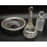 FOUR SILVER MOUNTED CUT GLASS DRESSING TABLE ITEMS comprising two circular dishes and two silver